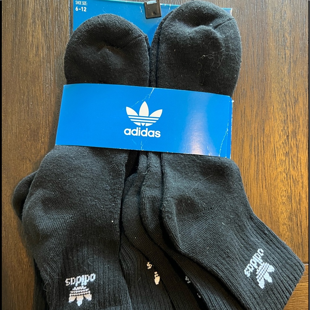 Never worn mens adidas socks ( high )